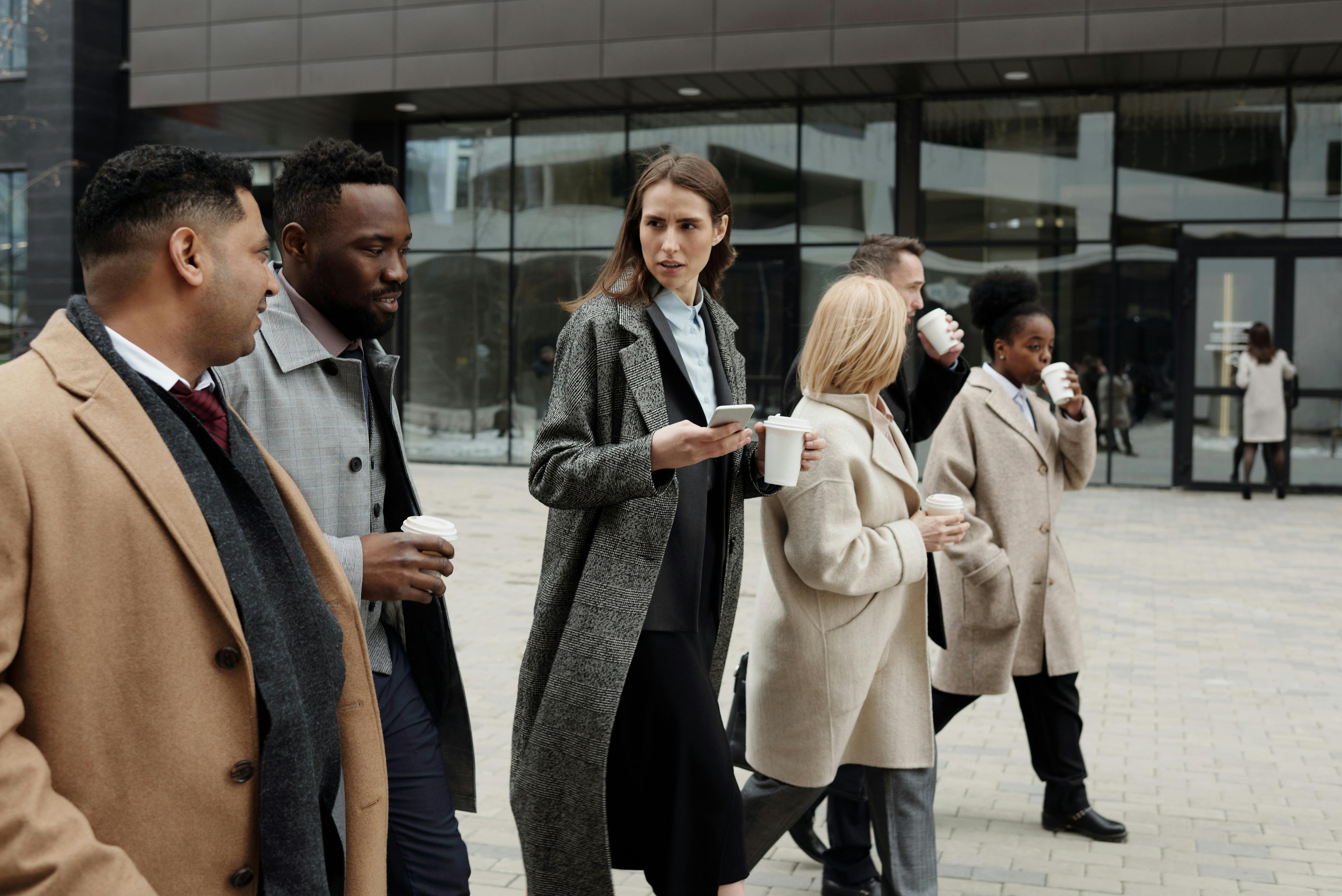 Business professionals with mobile devices